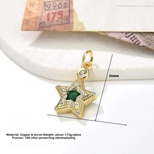 Macro detail of 18k gold plated star pendant with green zircon and 25mm dimensions