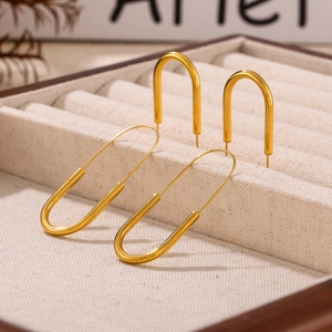 Minimalist 18k gold plated stainless steel U-shape paperclip earrings on display