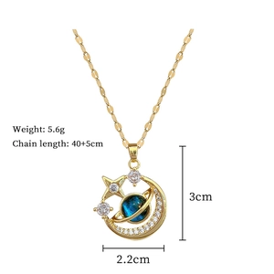 Detailed view of moon and stars pendant with dimensions 3cm x 2.2cm and 5.6g weight