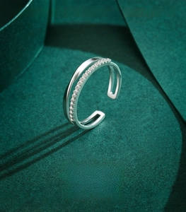 Detail of double-layer S925 sterling silver ring with micro-pave cubic zirconia stones
