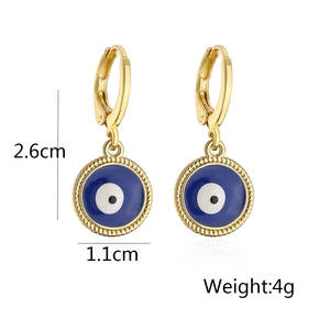 Detail of gold-plated evil eye earrings with blue enamel, measuring 2.6cm and 4g