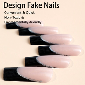 French tip coffin fake nails with nude base, black edges and silver glitter lines