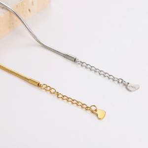 Minimalist stainless steel snake chain bracelet with heart charm in gold and silver