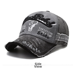 Detail of dark grey washed denim baseball cap with vintage embroidery and worn-out effects