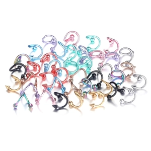 Colorful stainless steel twister rings for body piercings in various metallic finishes