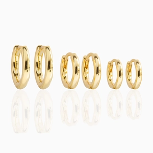 Detailed set of three polished 18K gold-plated hoop earrings in small to large sizes