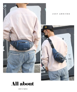 Waterproof navy blue multi-pocket waist bag with adjustable strap and buckle closure