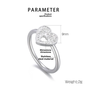 Macro view of silver stainless steel heart ring with rhinestones and 9mm height spec
