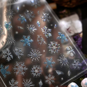 Winter snowflake nail art stickers with laser glitter and French retro crystal designs