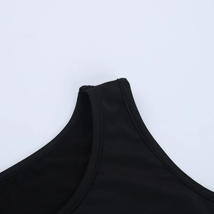 Macro shot of precise double-needle stitching on black sleeveless satin mini dress