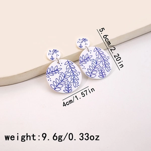 Blue and white porcelain style acrylic earrings with size and weight measurements