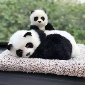 Detailed view of lifelike mother and baby panda plush toys with soft faux fur texture