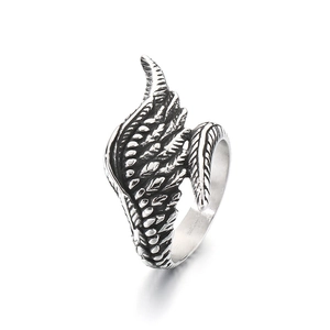 Vintage stainless steel angel wing ring with antique silver finish and feather details