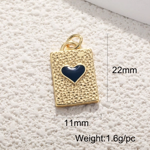 Detailed view of a gold-plated rectangular charm with 11x22mm size dimensions