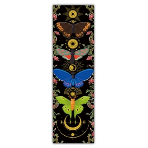 Detail of moon and sun tapestry showing butterfly illustrations on black backdrop