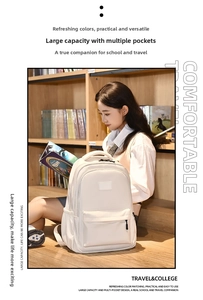 Detailed view of beige multi-pocket student backpack in a cozy bookstore setting