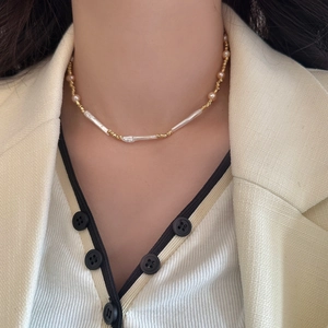 French vintage baroque pearl necklace with gold chain and mother of pearl accents