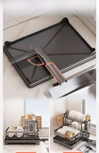 Détail de l'égouttoir à vaisselle gris double couche avec système de drainage rotatif 360