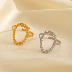 Anelli a sfere minimalisti in oro 18K e argento su elegante tessuto di seta