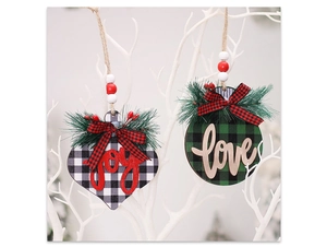 Detail of wooden Christmas ornaments with buffalo plaid patterns and joy love carvings