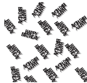 Detailed view of black glitter Happy Birthday confetti pieces for party table decoration