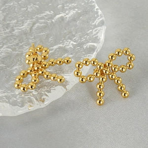 Orecchini a fiocco in acciaio inossidabile placcato oro 18k con design a micro-perline