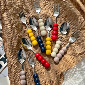 304 stainless steel dessert fork and spoon set with colorful bubble ceramic handles