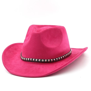 Rose red faux suede western cowboy hat with black studded band on white background