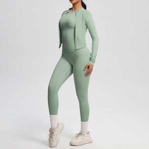Three-piece light green yoga set with high-waist leggings and zip-up sports jacket