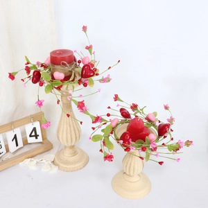 Valentine candle rings with red pink hearts and berries on white vintage candle holders