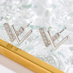Elegant silver double V stud earrings featuring brilliant zircon insets on high-quality metal