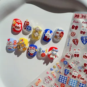 Macro detail of 3D embossed nail stickers with cute rabbit and traditional motifs