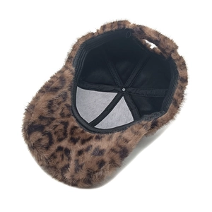 Faux fur leopard print baseball cap featuring soft plush texture and black fabric lining