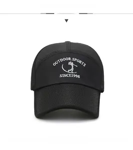 Close-up of white embroidery on a black mesh baseball cap with outdoor sports text