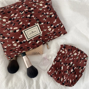 Floral pleated chiffon makeup bag set with Pleasant Time label for travel storage
