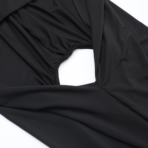 Detailed close-up of the black high-elastic knit fabric and hollowed-out side cutout design