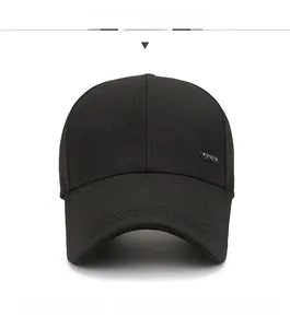 Front view of a black baseball cap featuring a decorative metal SPORT plate on the side