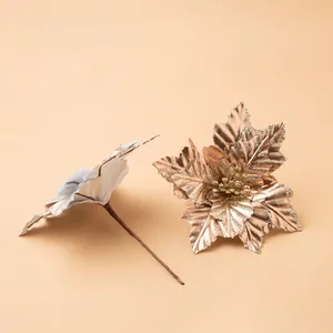 Glittery artificial poinsettia flowers in champagne and white for Christmas DIY decor