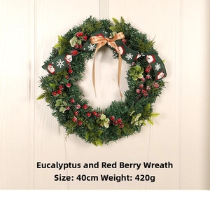 Detail of 40cm Christmas wreath with eucalyptus leaves, red berries and festive ribbons