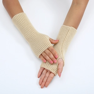 Detailed view of beige ribbed knit fingerless gloves showing the soft wool texture