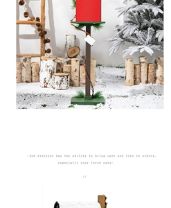 Detailed view of red Christmas mailbox with pine needles in a snowy festive forest scene