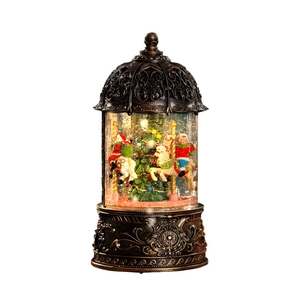 Vintage bronze Christmas musical snow globe with Santa and reindeer on rotating carousel