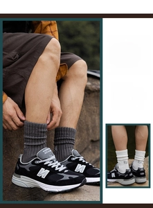 Detailed close-up of thick cotton terry crew socks with ribbed cuffs in a workwear style