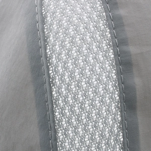 Close-up of light grey breathable honeycomb mesh and reinforced stitching on sport hat