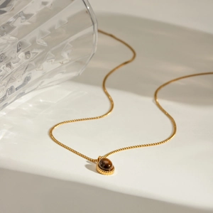 Elegant 18k gold plated stainless steel necklace with oval brown tiger eye stone pendant