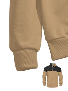 Detailed close-up of ribbed cuffs on a men's khaki and black knit polo sweater