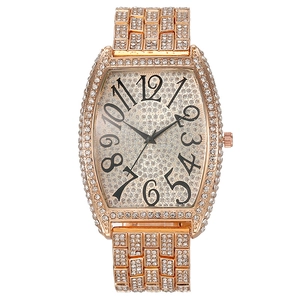Luxury rose gold women's watch with iced-out rhinestone barrel case and Arabic numerals