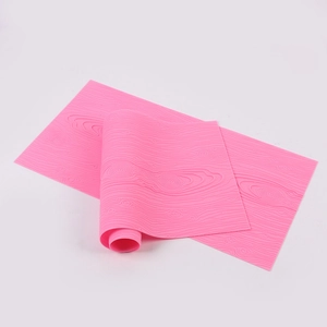 Pink silicone mold featuring detailed wood bark texture for cake and clay DIY baking