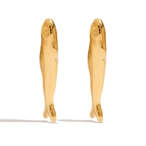 Close-up of elegant gold fish-shaped earrings with a polished metallic finish
