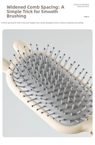 Macro shot of air cushion massage brush with wide-tooth design and integrated mirror